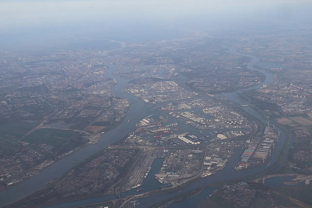 An aerial view of the Port of Rotterdam, showing waterways, terminals and connecting transport infrastructure.